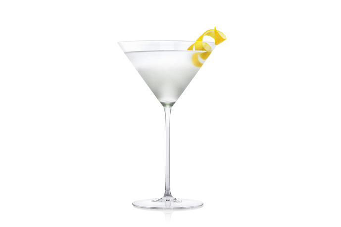A stylish martini glass filled with a clear cocktail, garnished with a twist of lemon peel. Elegant and refreshing presentation