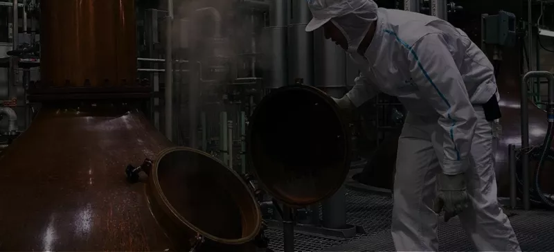 Distillery worker producing Roku Gin