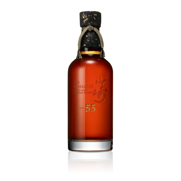 Amber bottle of Suntory Whisky Yamazaki 55 year old with string tie around bottle next