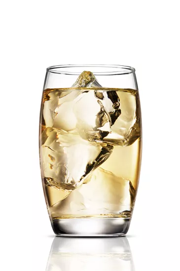 A glass of Whisky and Water with large ice cube