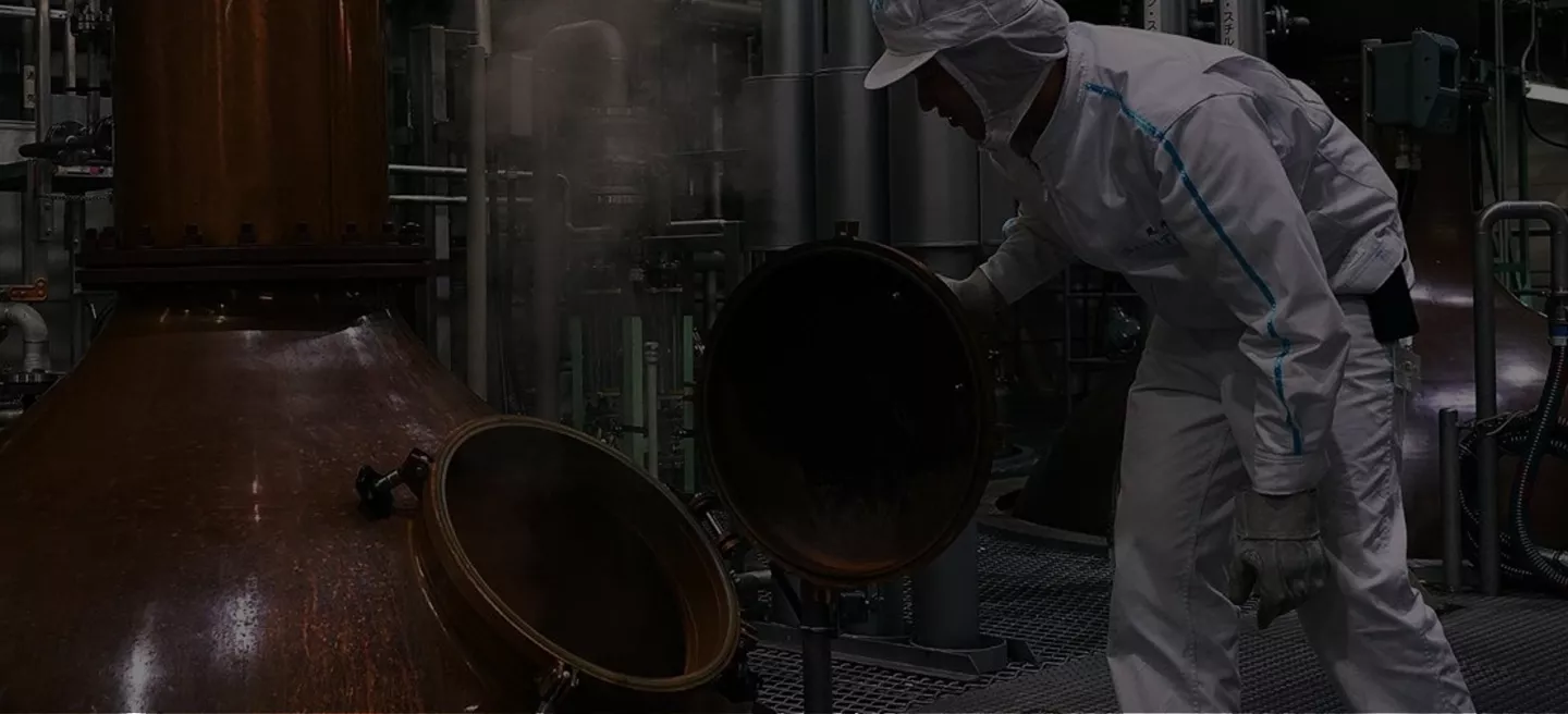 Distillery worker producing Roku Gin