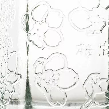 Glass with cherry blossom embossing closeup
