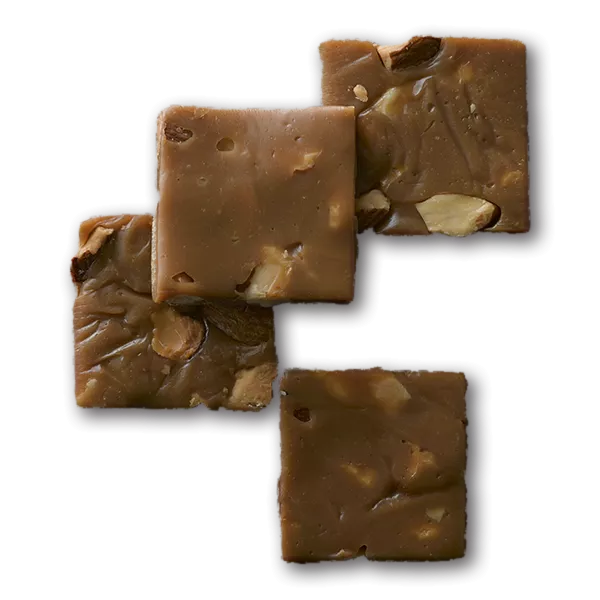 Four caramel pieces with nuts