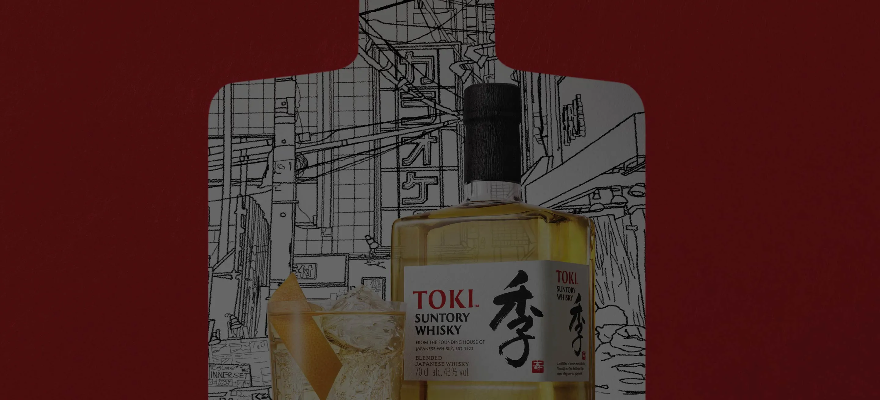 A glass and a bottle of toki.