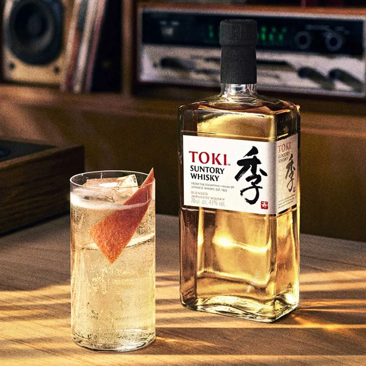 A glass and a bottle of toki.