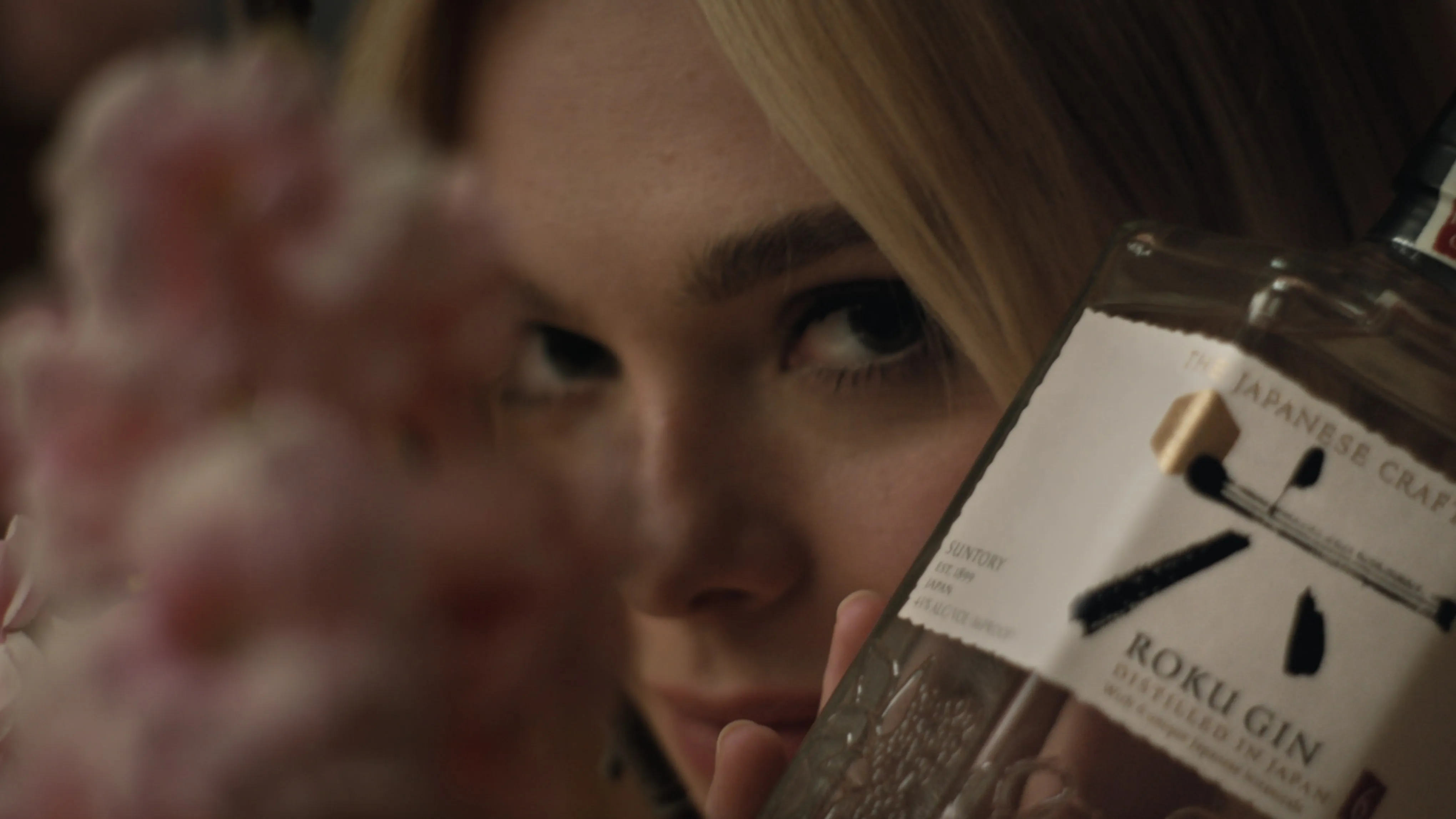 elle fanning with glass of roku gin