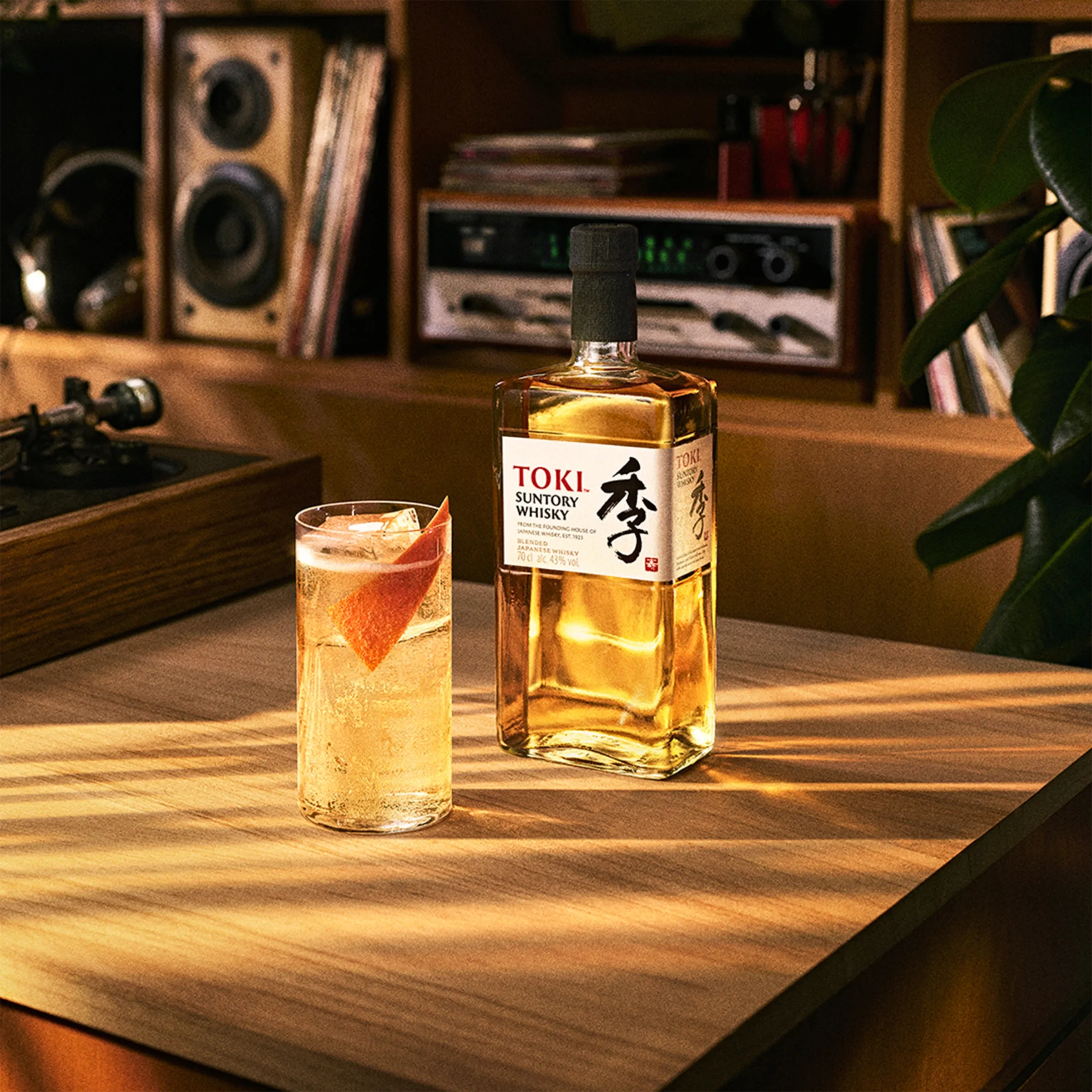 Toki Bottle & Glass With Music Background.