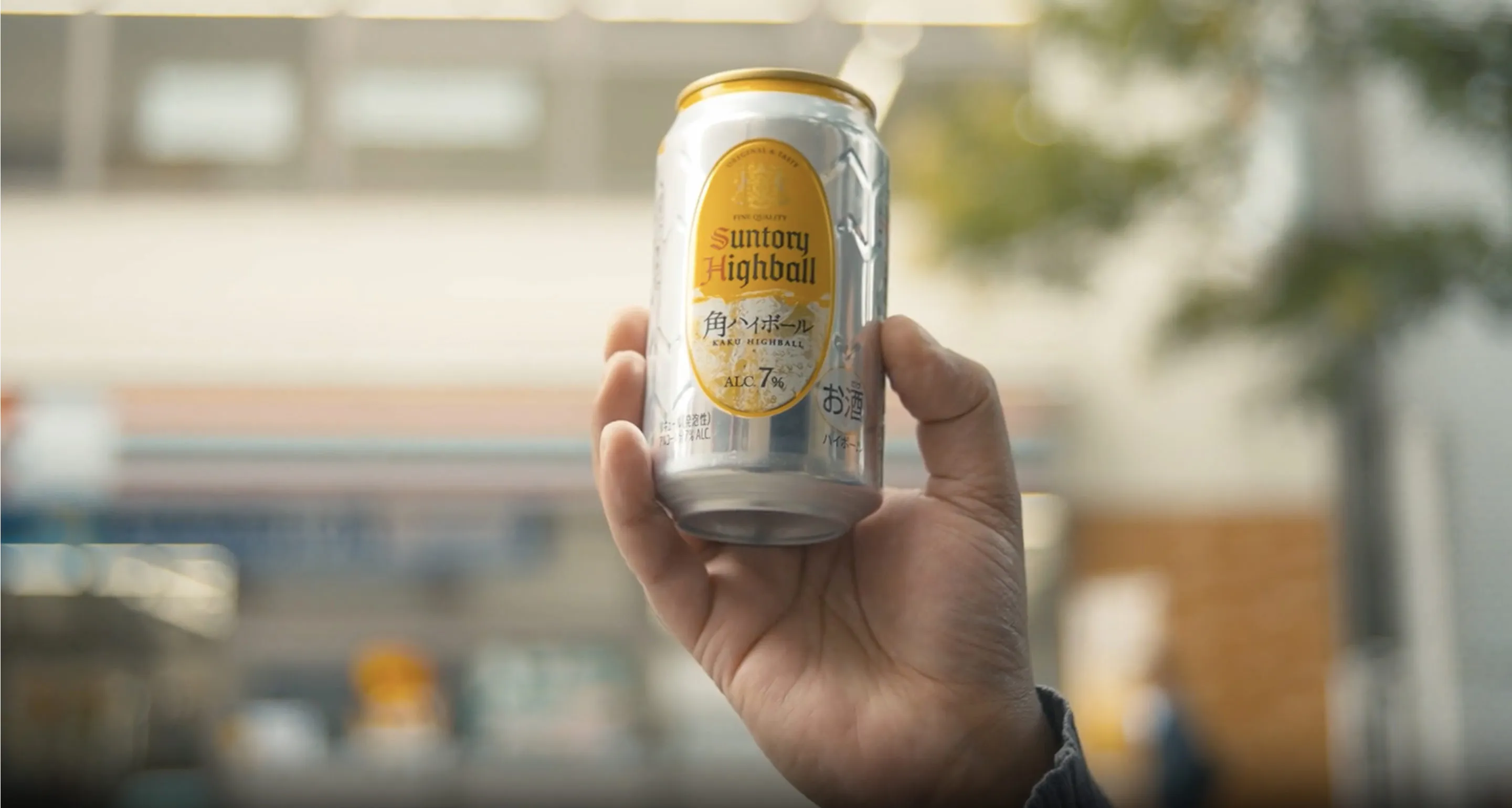 A person holding can