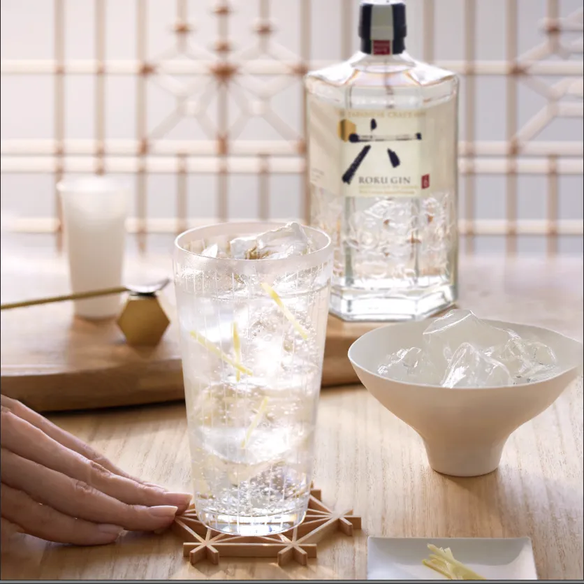 Roku gin bottle with a glass filed with roku gin