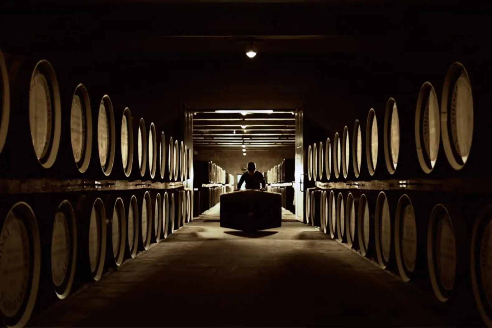 Employee moving barrel