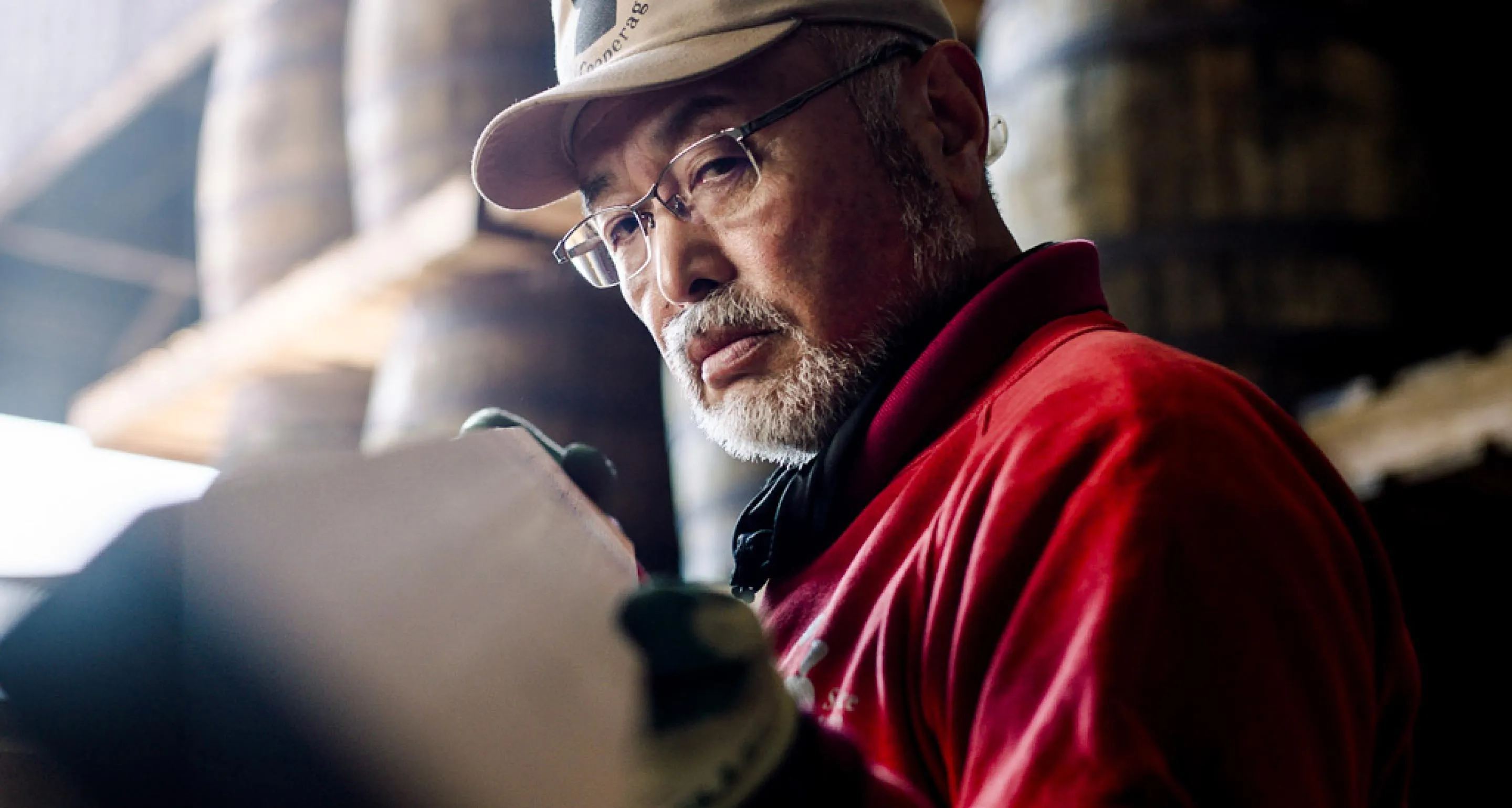 Worker in distillery