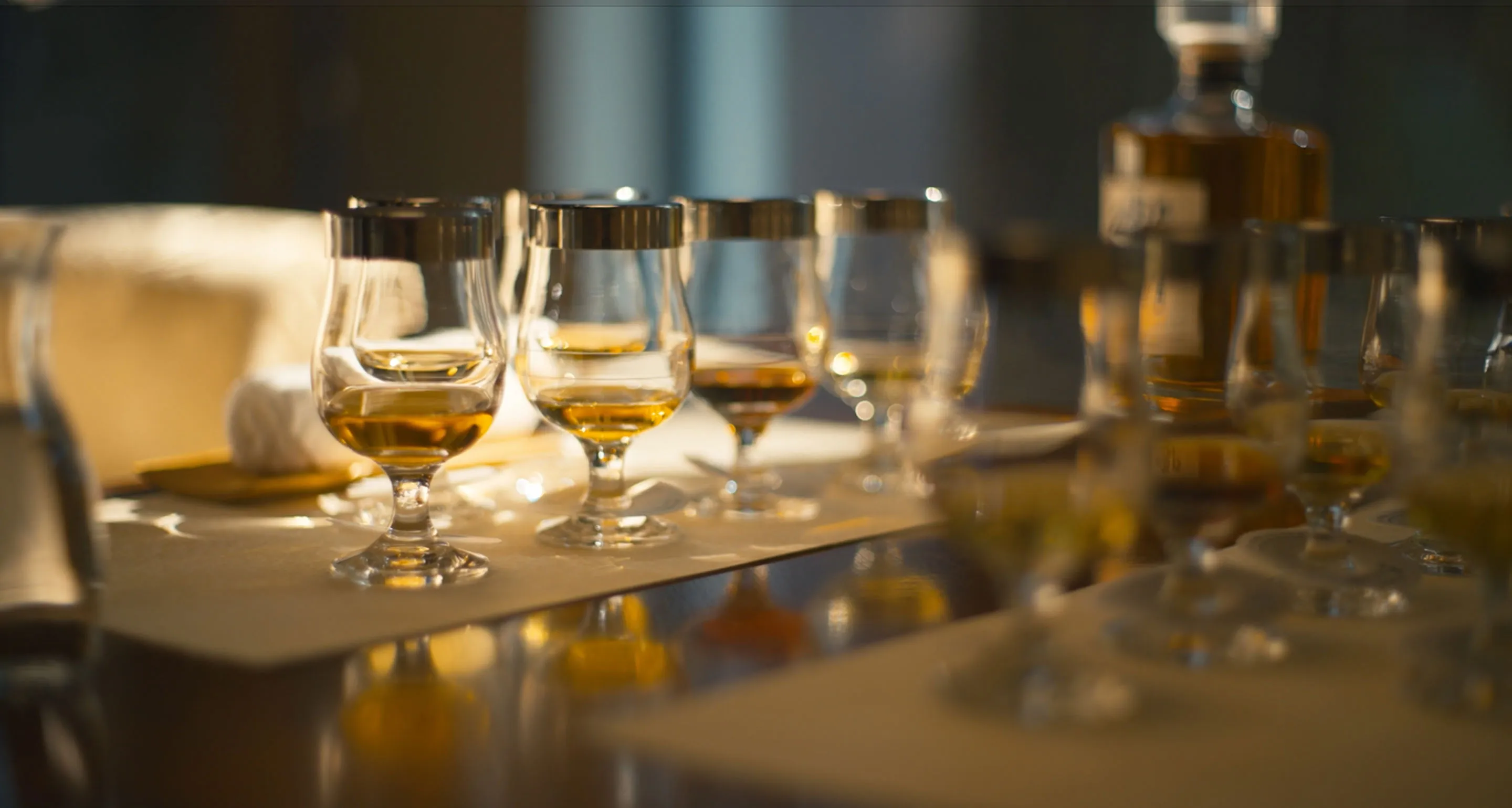 whisky glasses over table placed beautifully