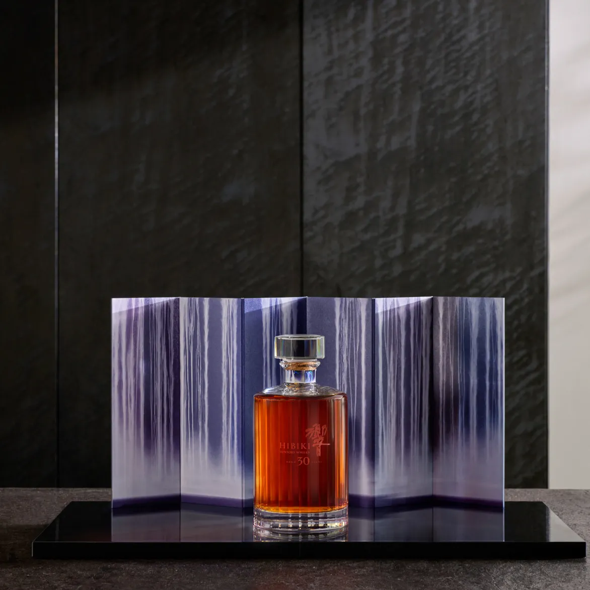 hibiki 30 year old bottle with black background