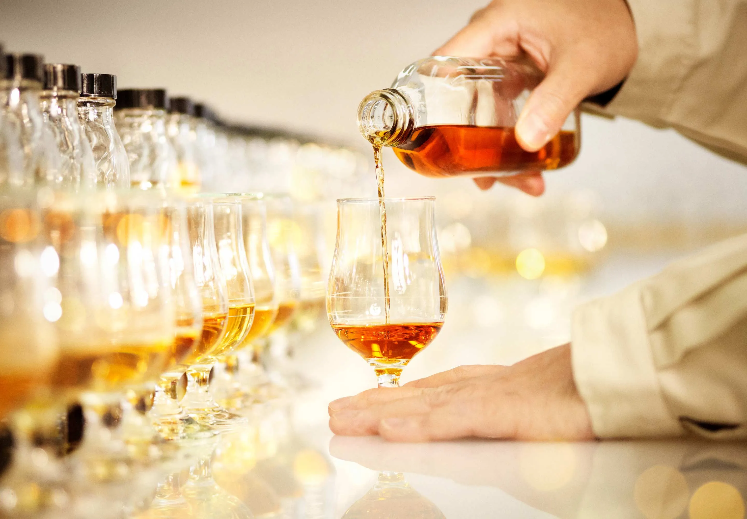 whisky poring in glass