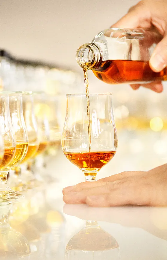 whisky poring into glass